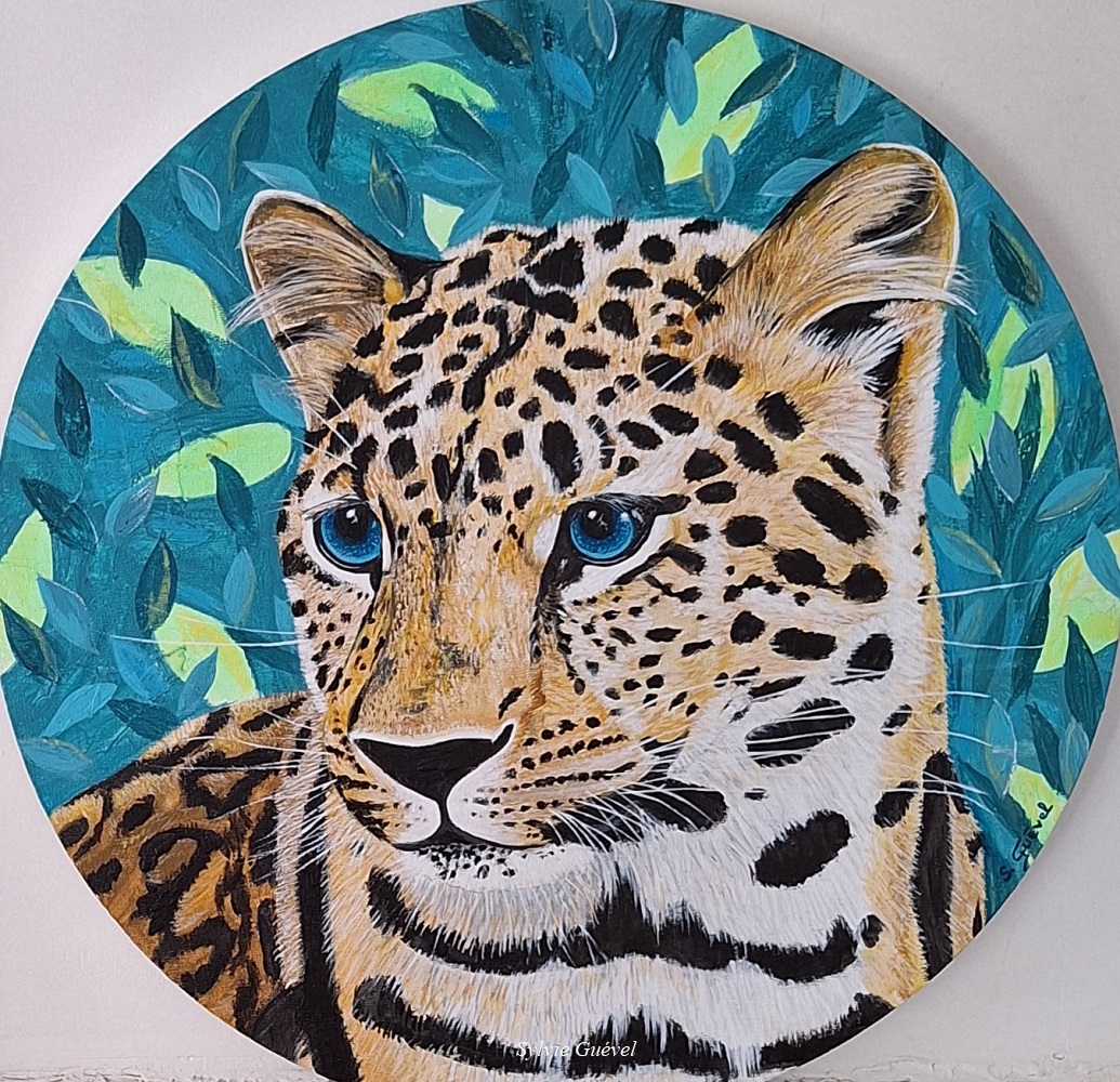 Tableau rond de Sylvie Guével qui représente un jeune léopard